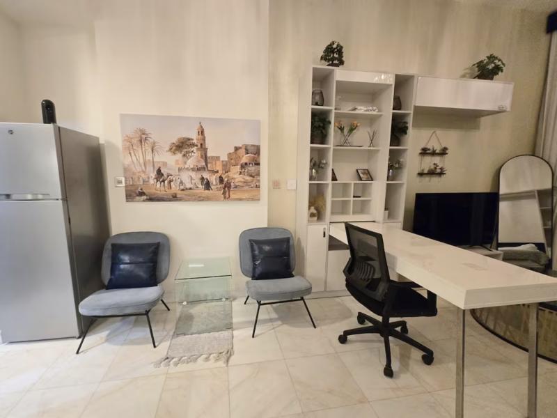 Seating corner, fridge and work desk